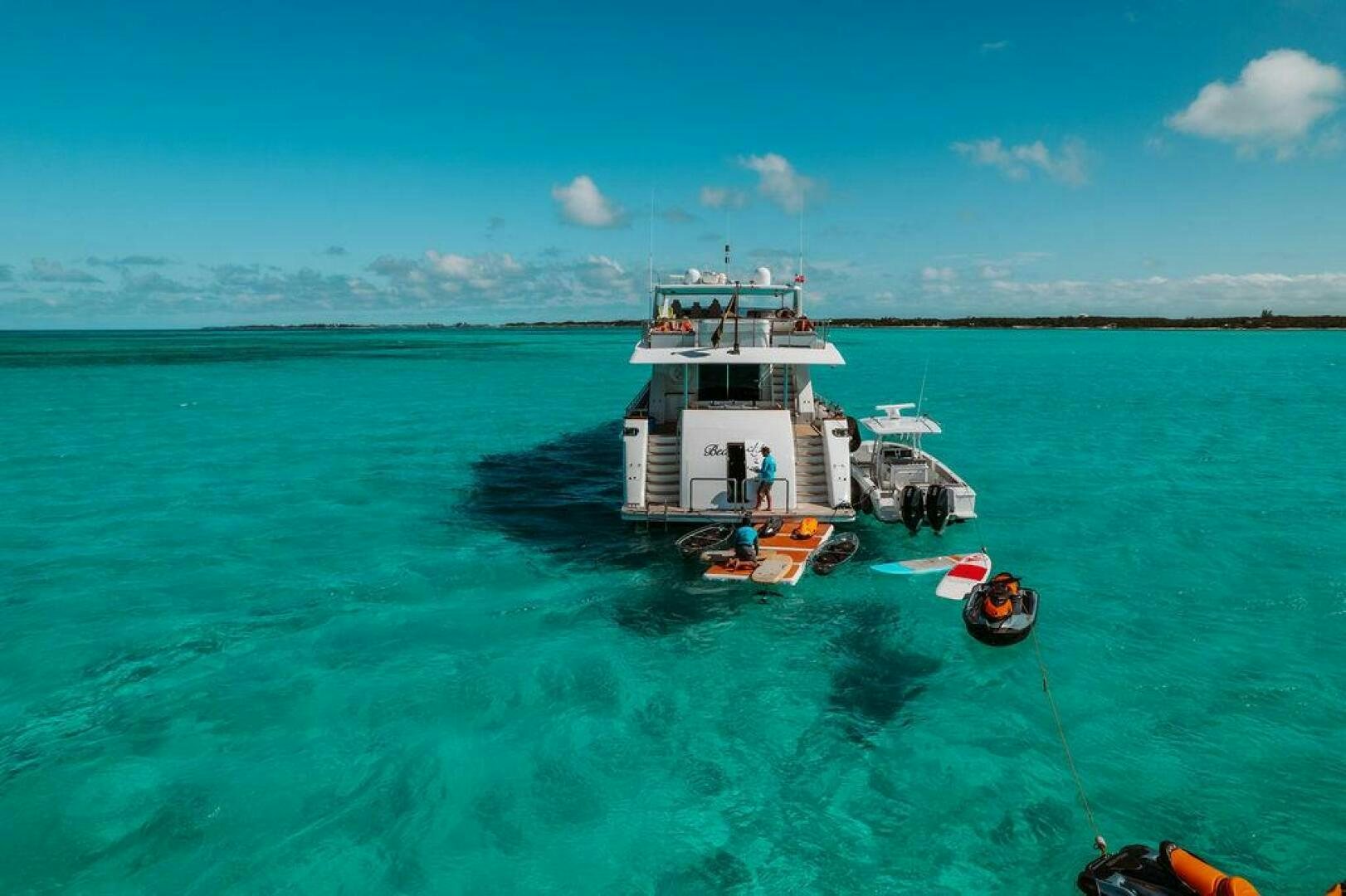 a boat in the water aboard BEACHFRONT Yacht for Sale