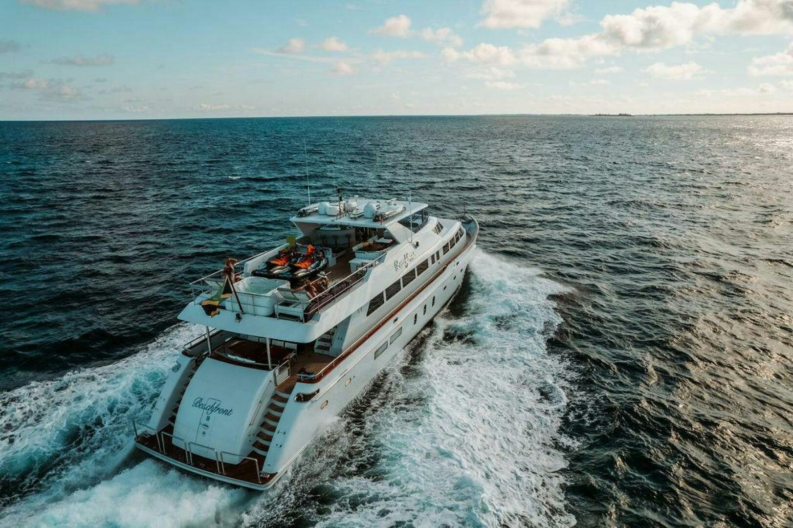 a boat on the water aboard BEACHFRONT Yacht for Sale