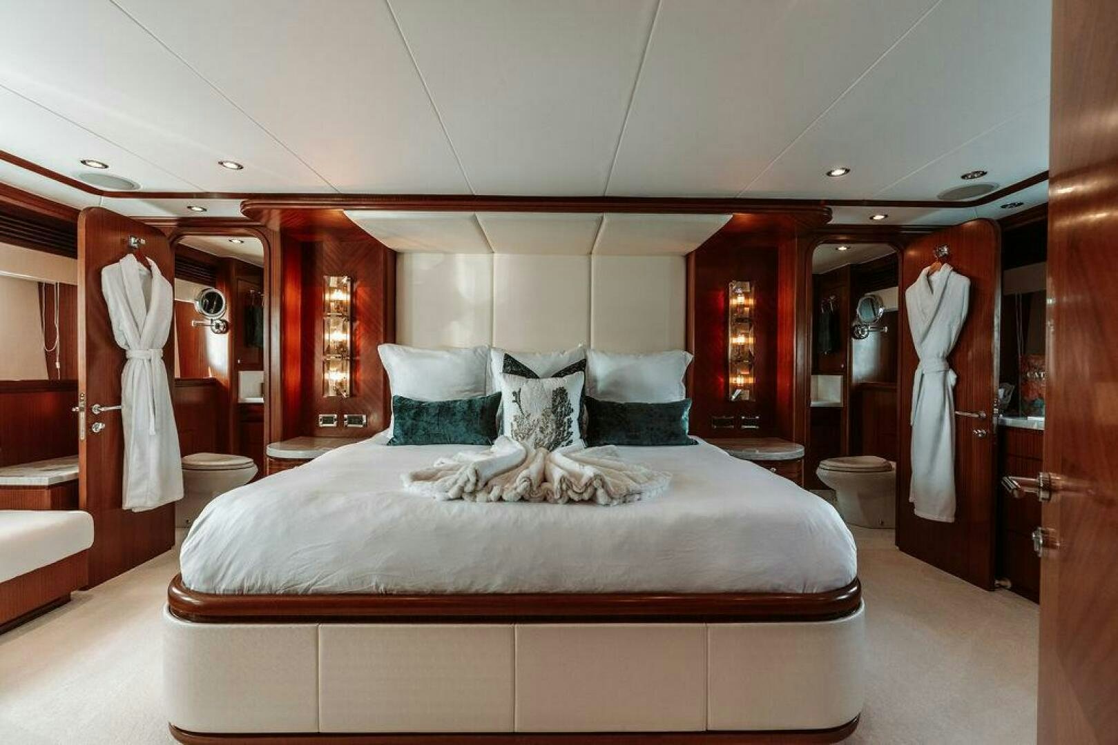 a large bed in a hotel room aboard BEACHFRONT Yacht for Sale