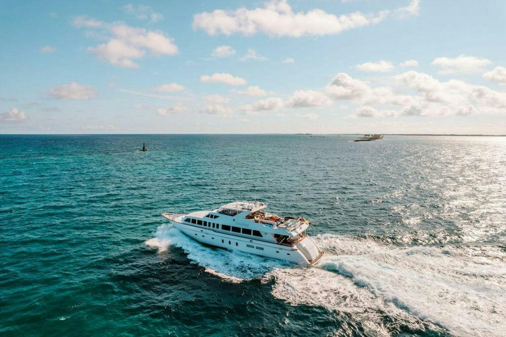 a boat on the water aboard BEACHFRONT Yacht for Sale