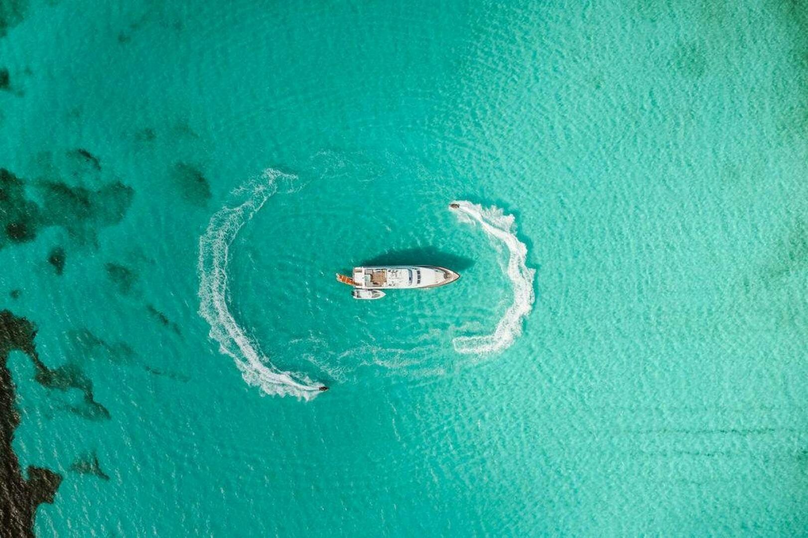 a stingray swimming in the ocean aboard BEACHFRONT Yacht for Sale