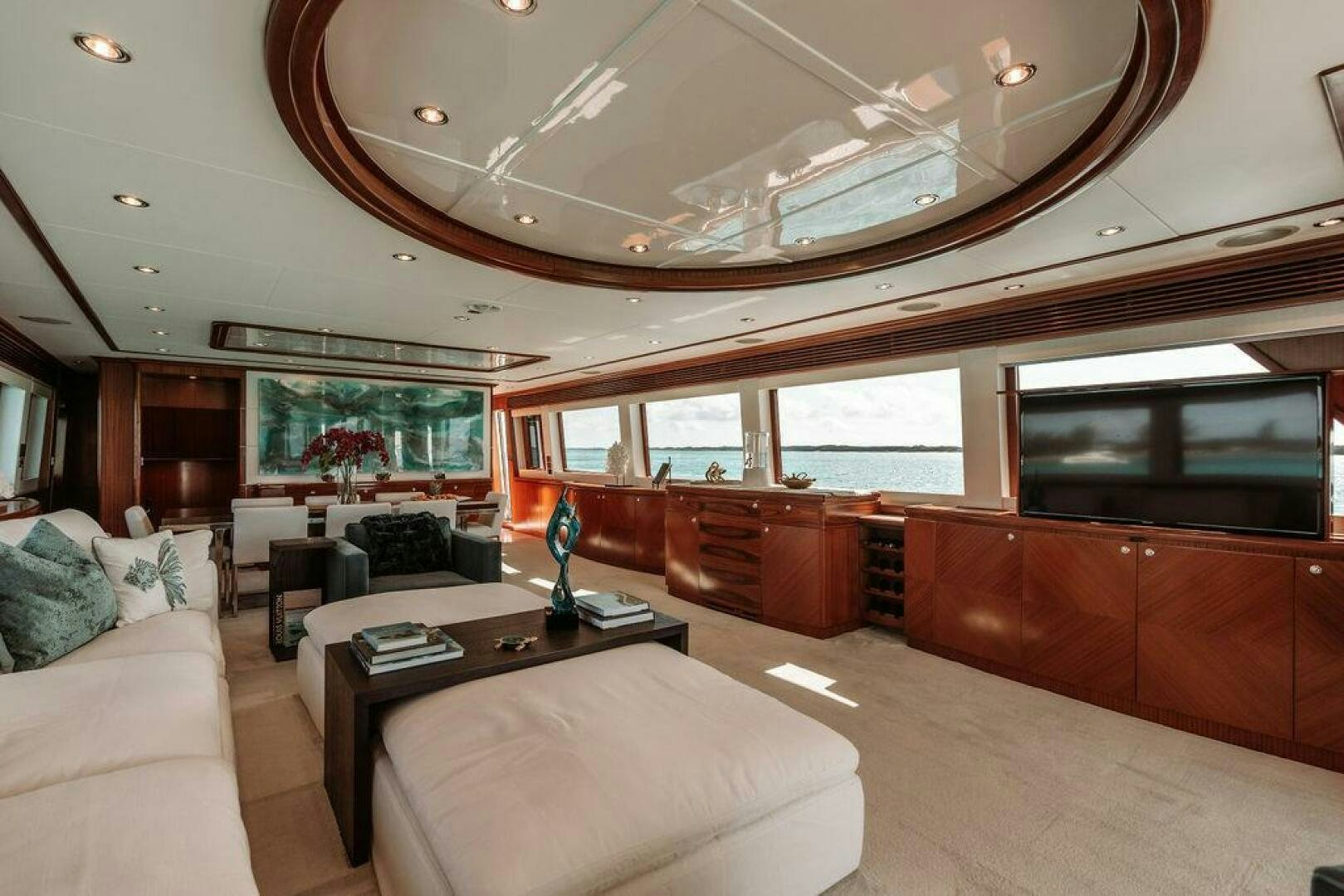 a living room with a large ceiling aboard BEACHFRONT Yacht for Sale