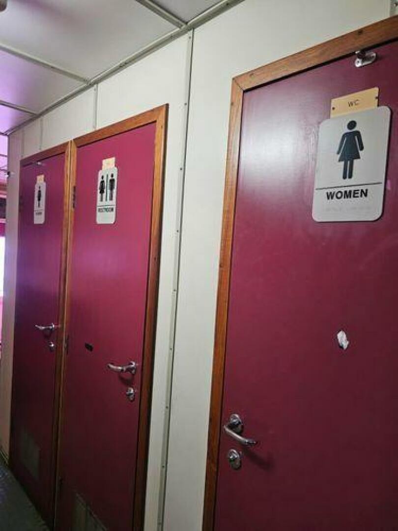 a red locker with a white door aboard JADEN SUN Yacht for Sale