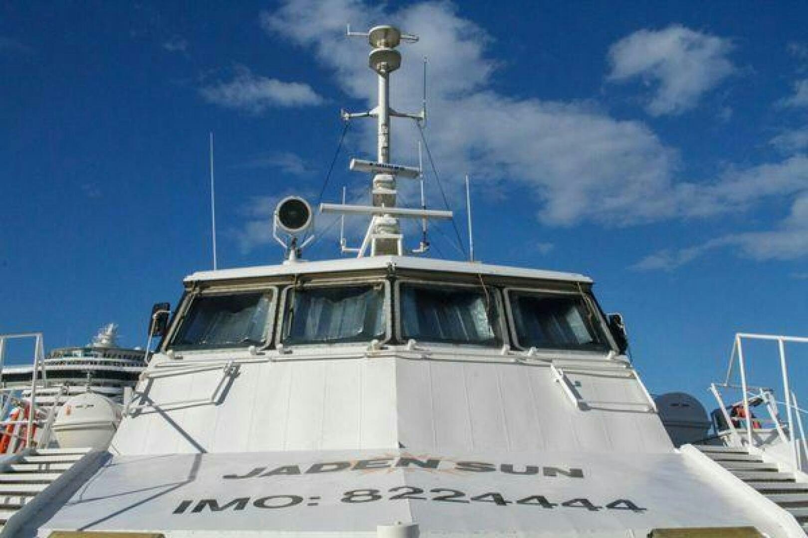 a white boat with a light on top aboard JADEN SUN Yacht for Sale