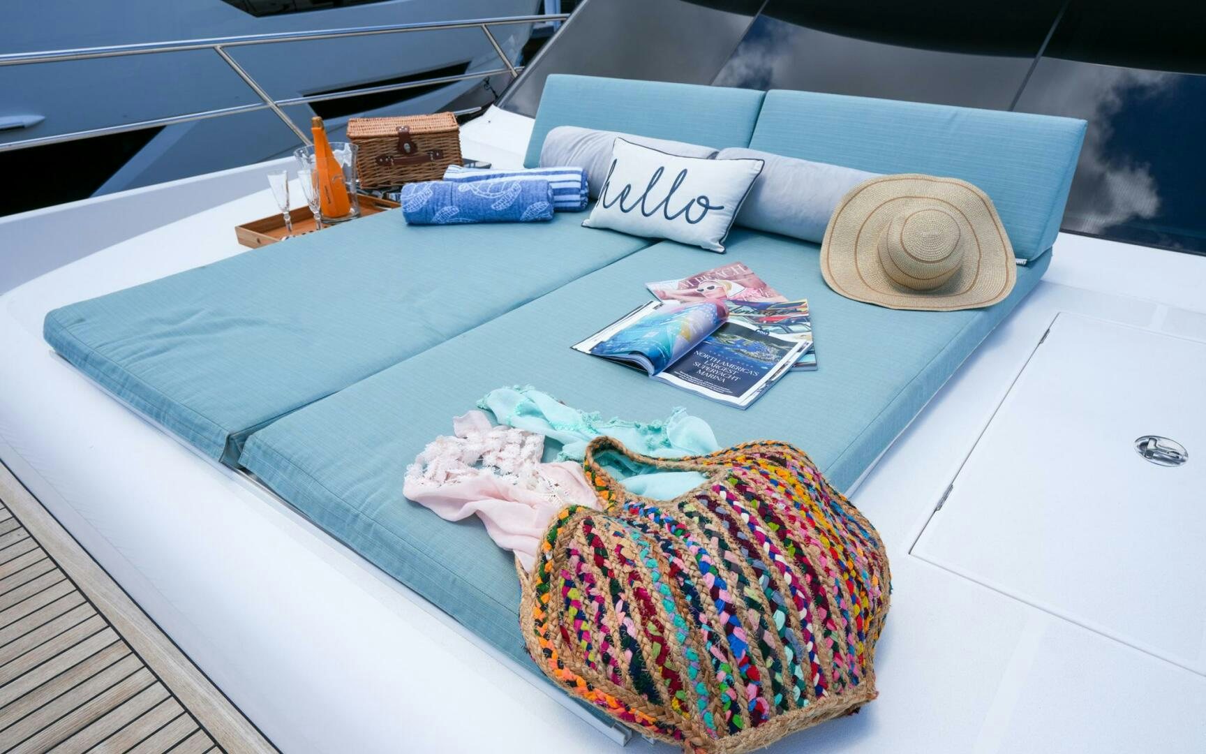 a table with a towel and a towel on it aboard CASTINA Yacht for Sale