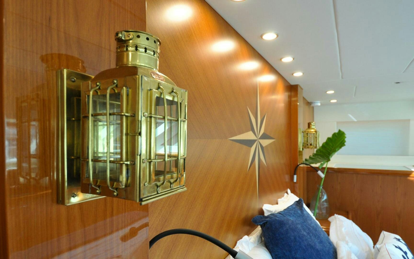 a glass cabinet with a plant in it aboard CASTINA Yacht for Sale