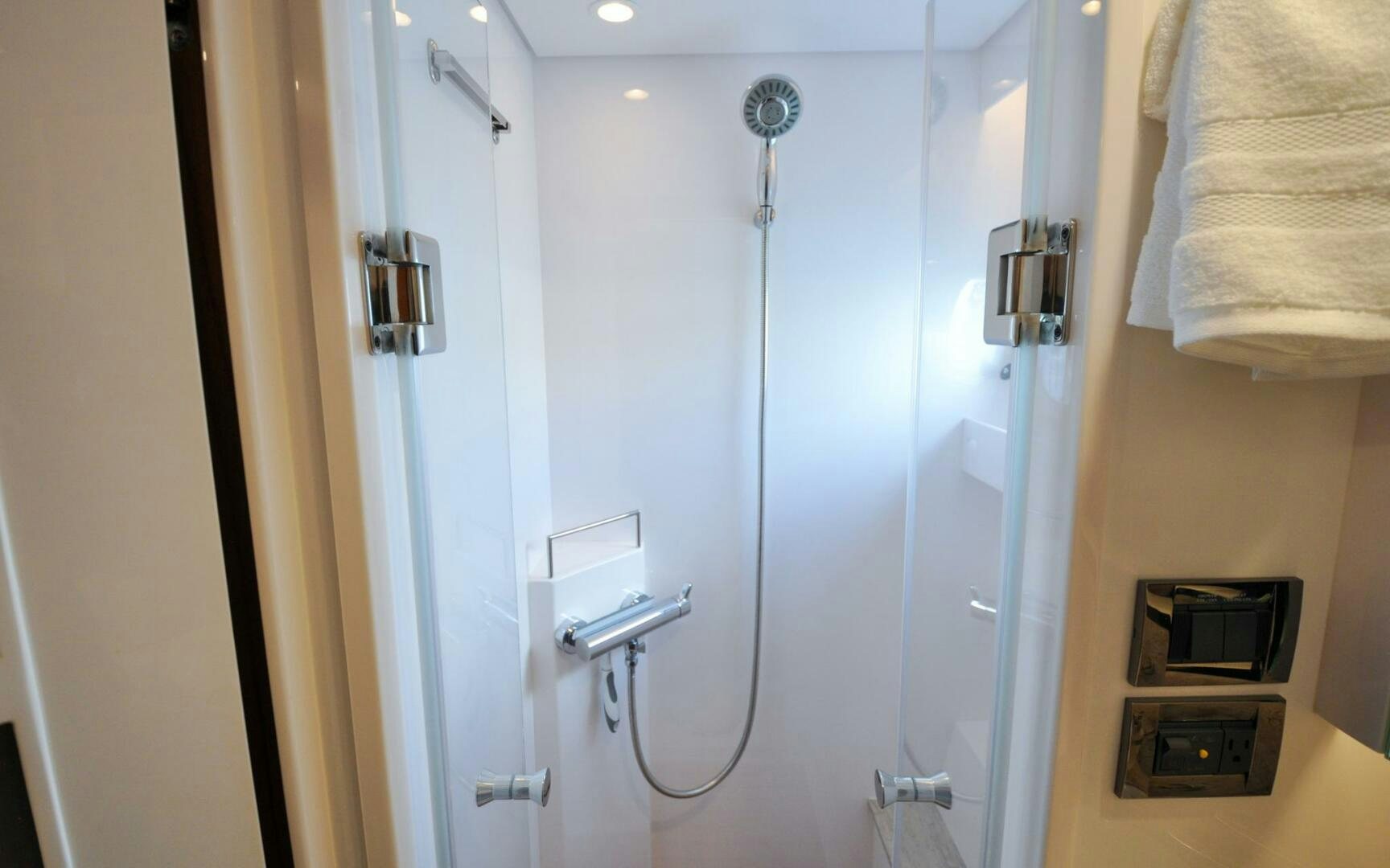 a shower unit in a bathroom aboard CASTINA Yacht for Sale