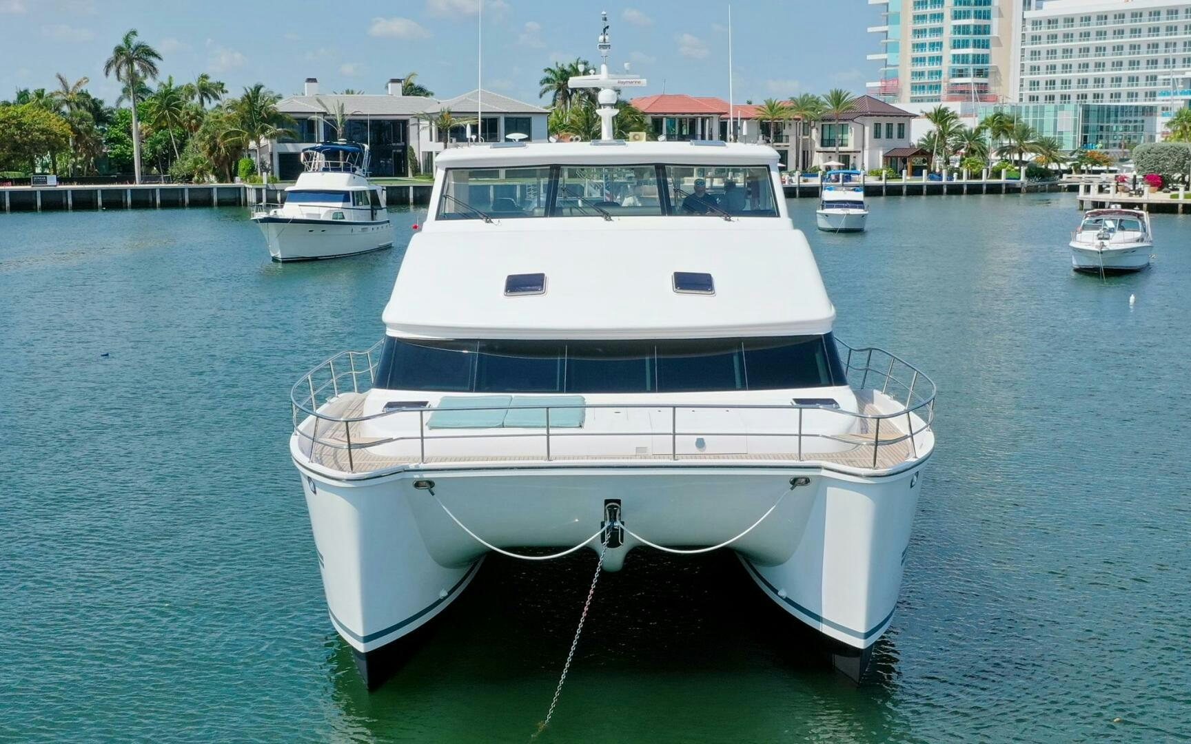 a white boat in the water aboard CASTINA Yacht for Sale