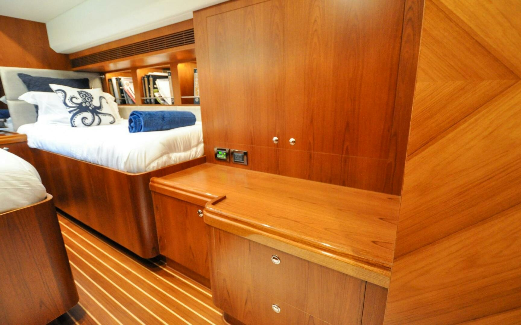 a bed in a room aboard CASTINA Yacht for Sale