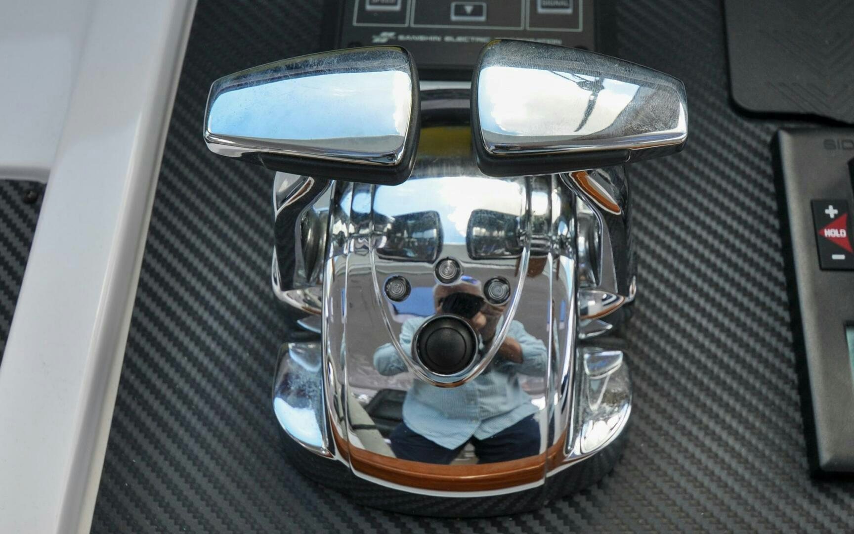 a car with a steering wheel aboard CASTINA Yacht for Sale