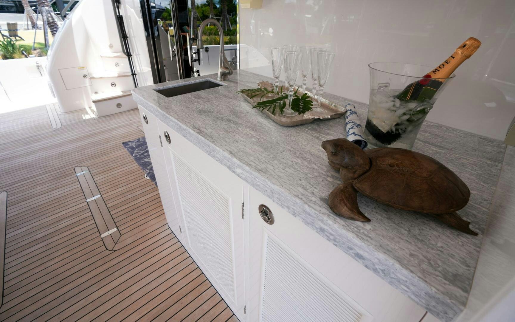 a dog lying on a counter aboard CASTINA Yacht for Sale