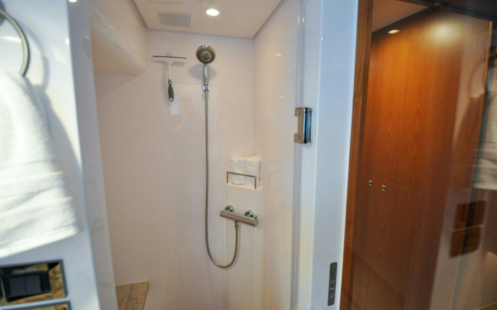 a bathroom with a shower and a sink aboard CASTINA Yacht for Sale