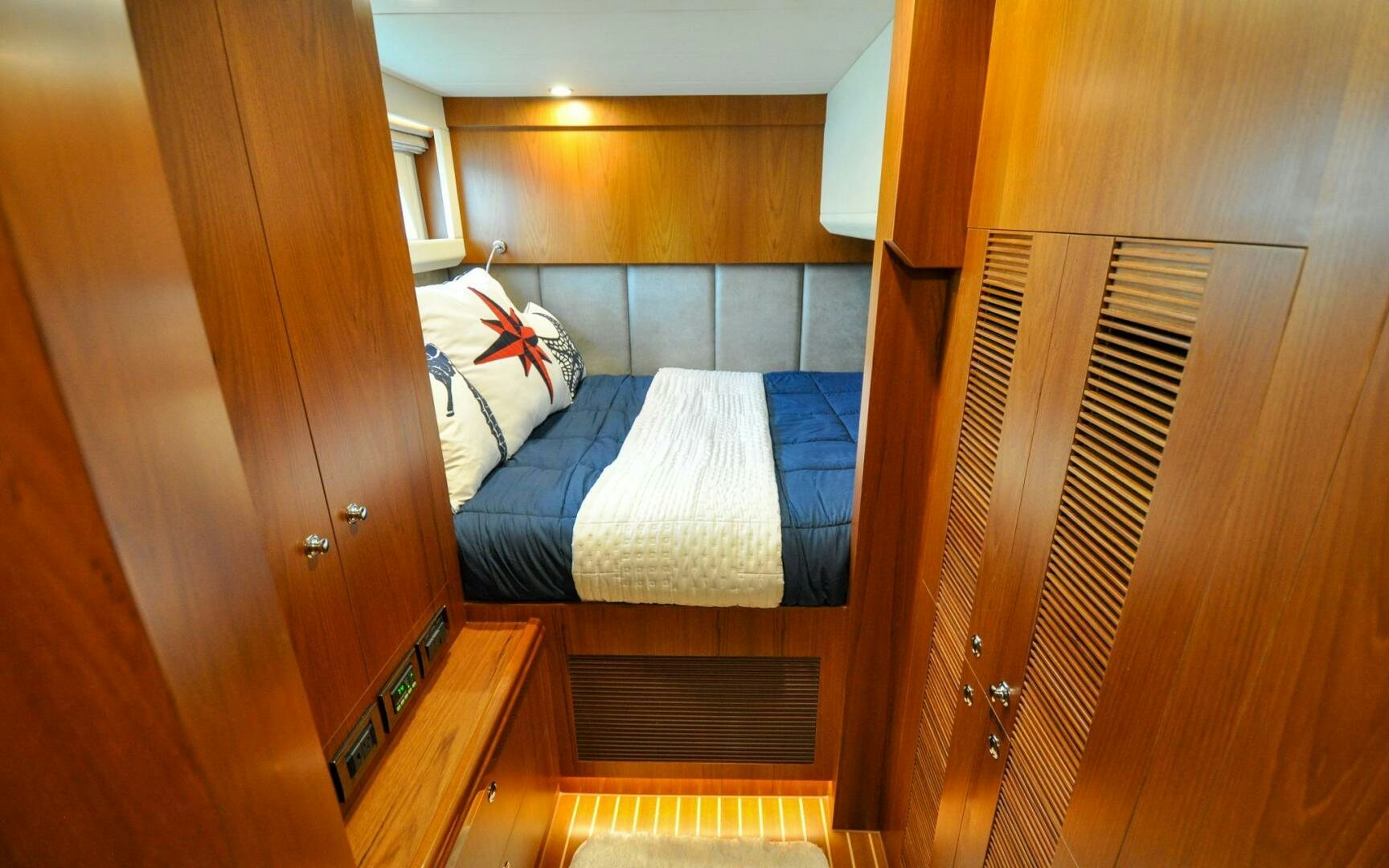 a bed in a room aboard CASTINA Yacht for Sale