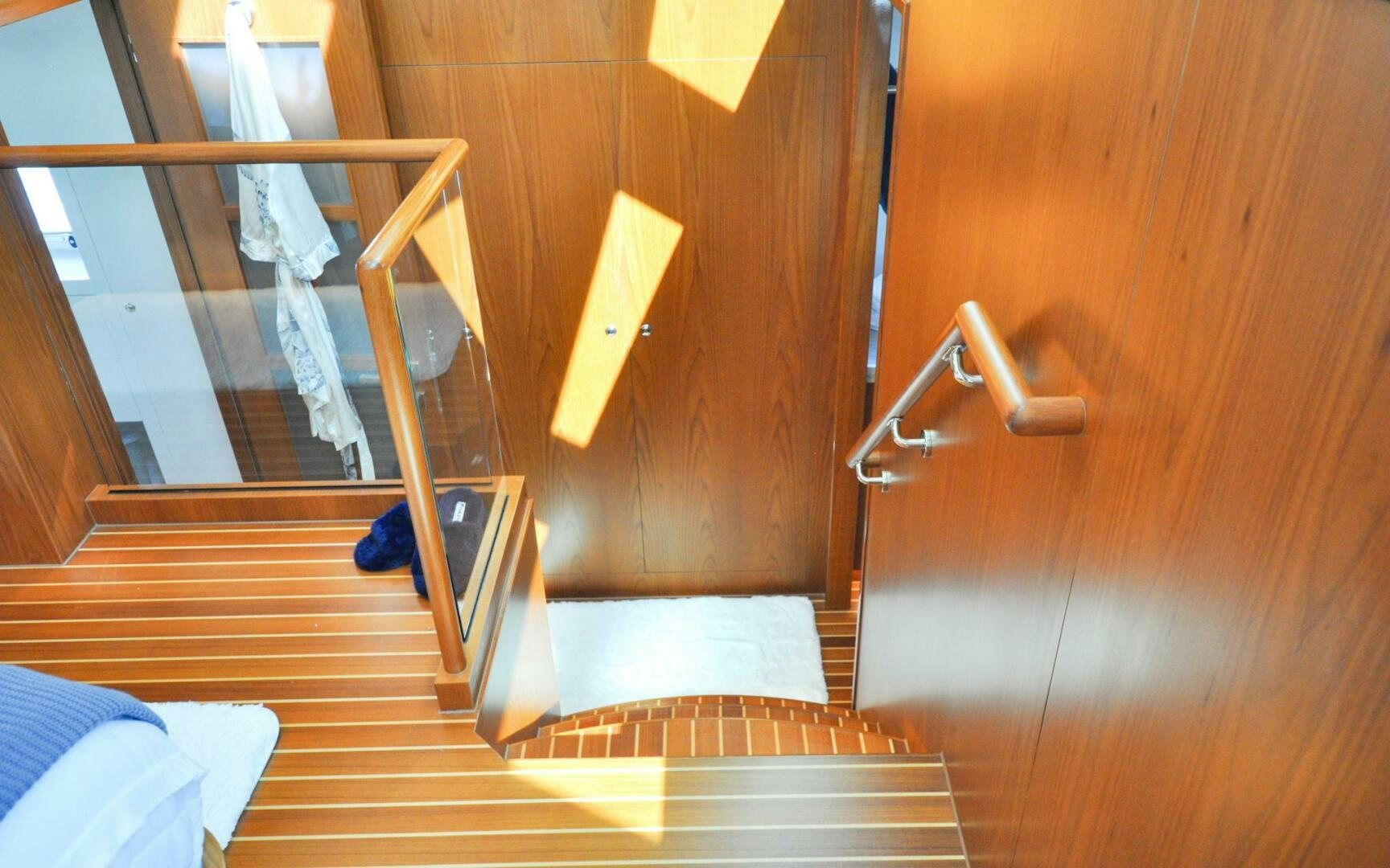 a set of stairs in a room aboard CASTINA Yacht for Sale