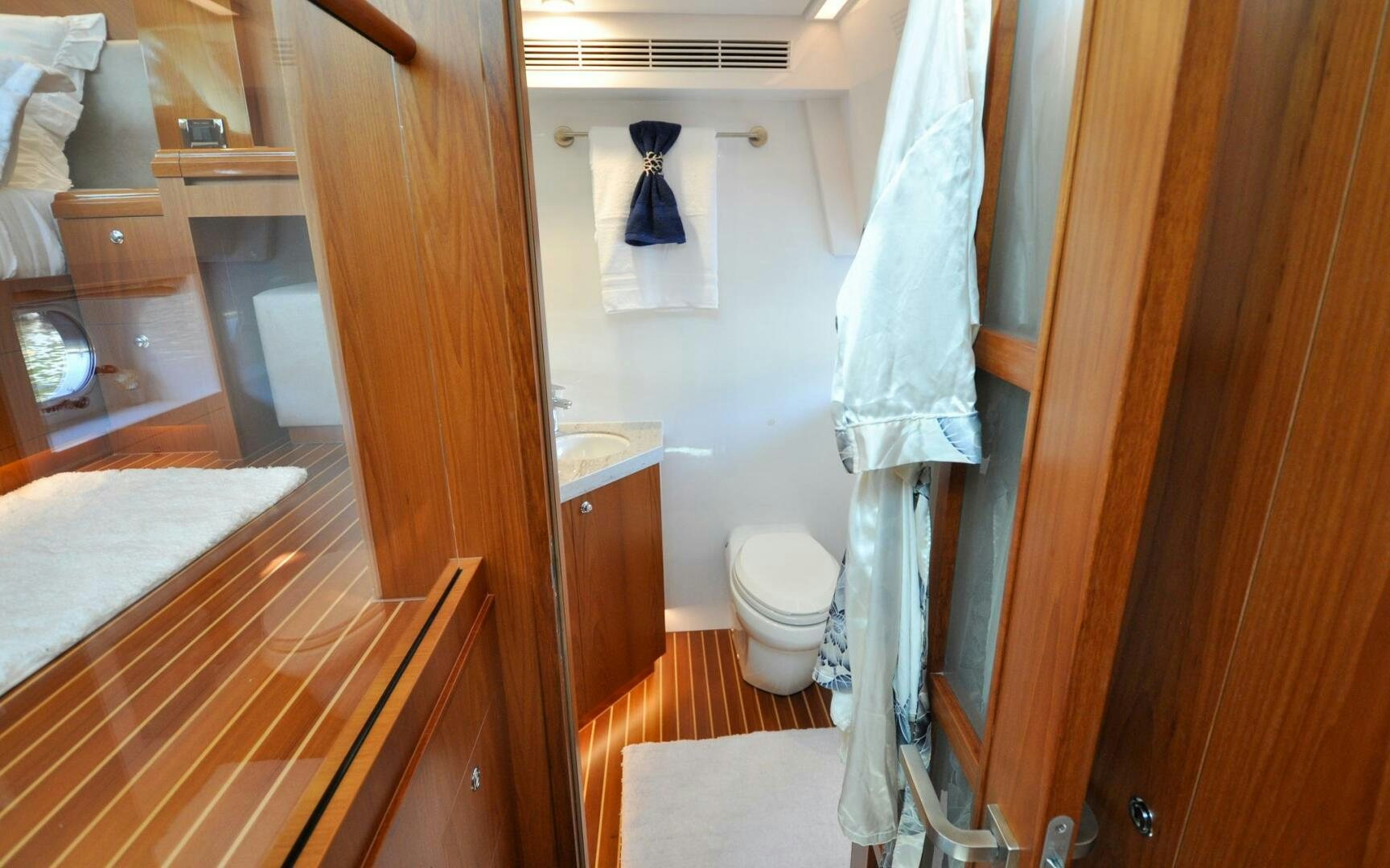 a bathroom with a towel on the wall aboard CASTINA Yacht for Sale