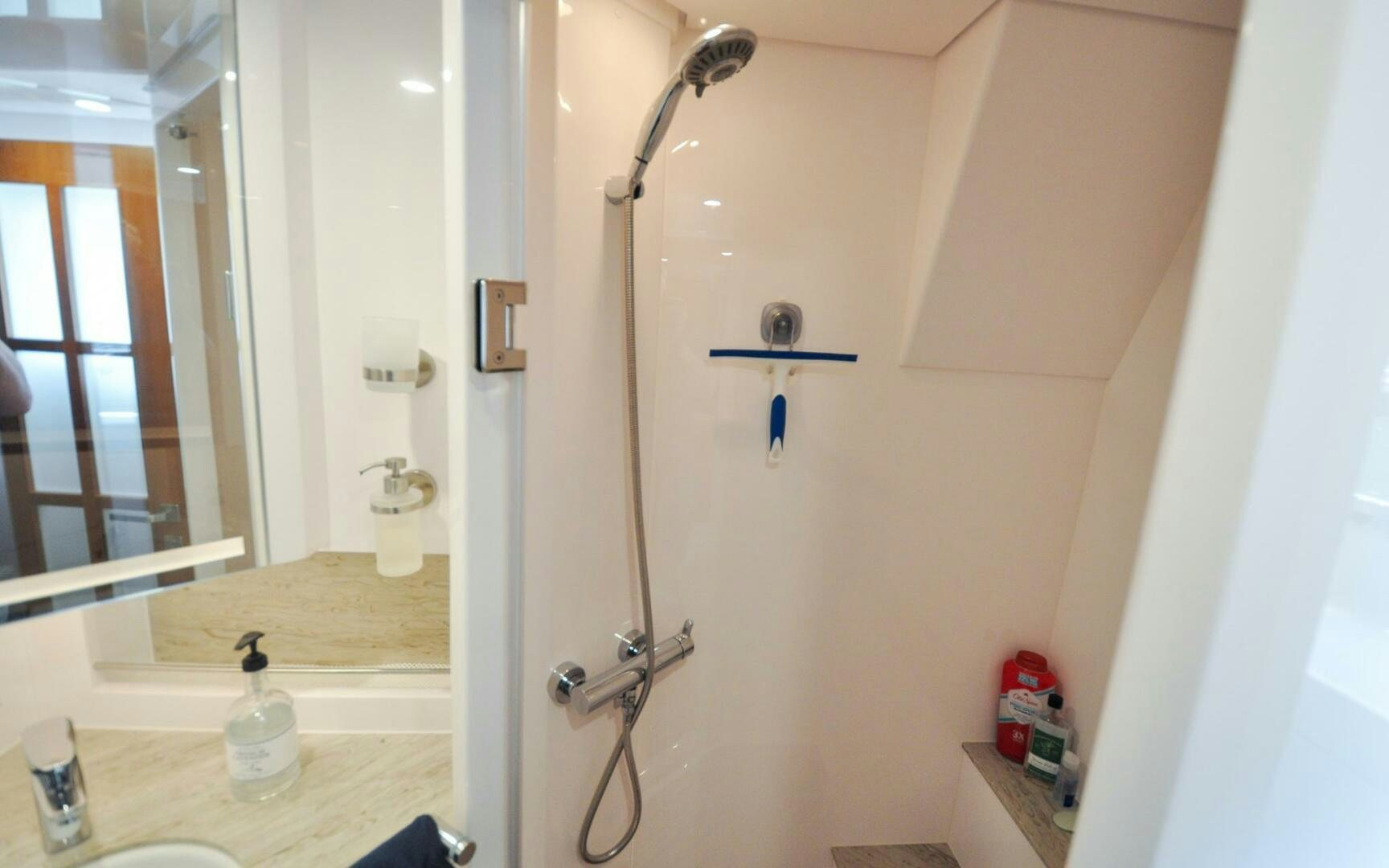 a shower with a glass door aboard CASTINA Yacht for Sale