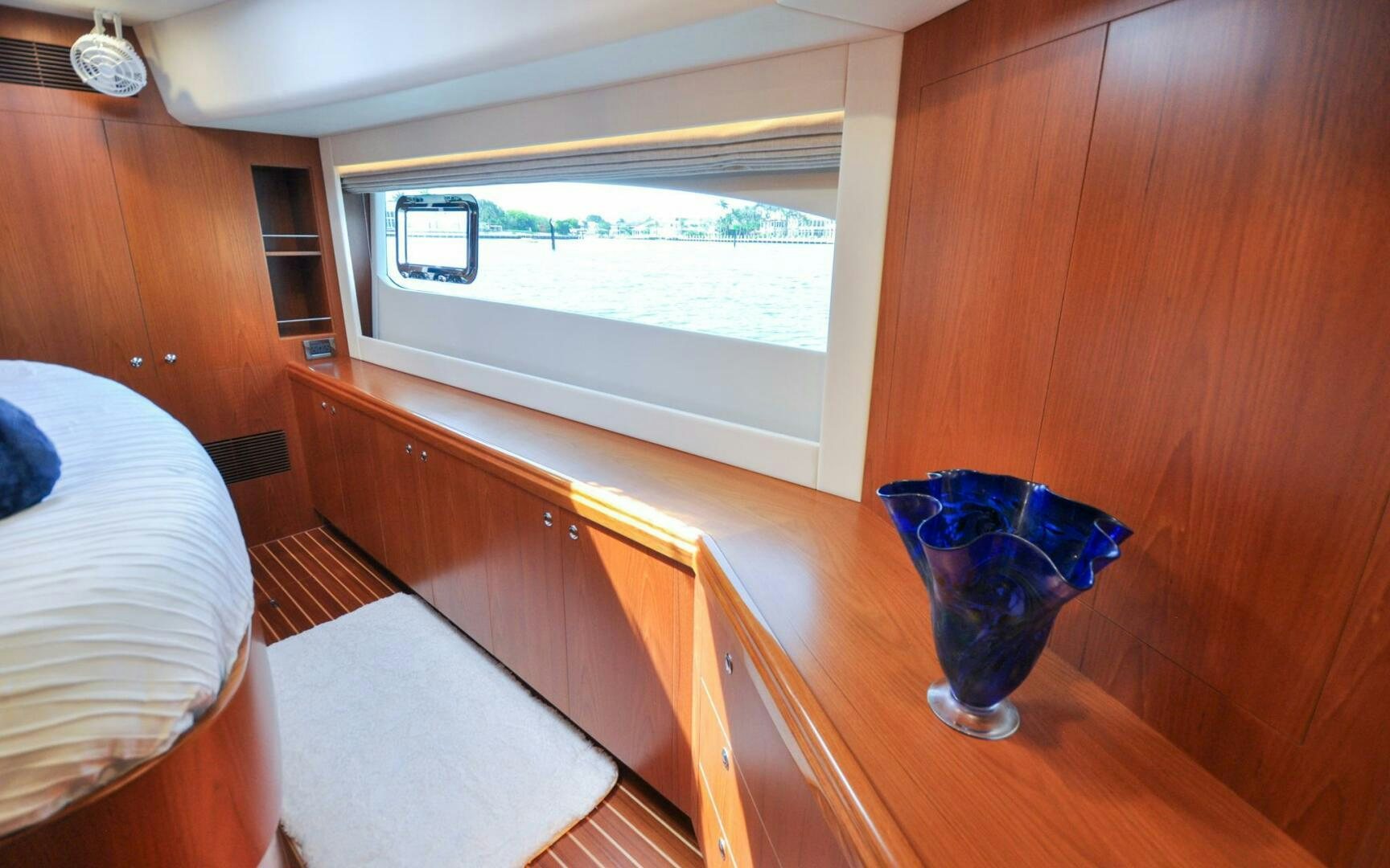 a room with a table and a window aboard CASTINA Yacht for Sale