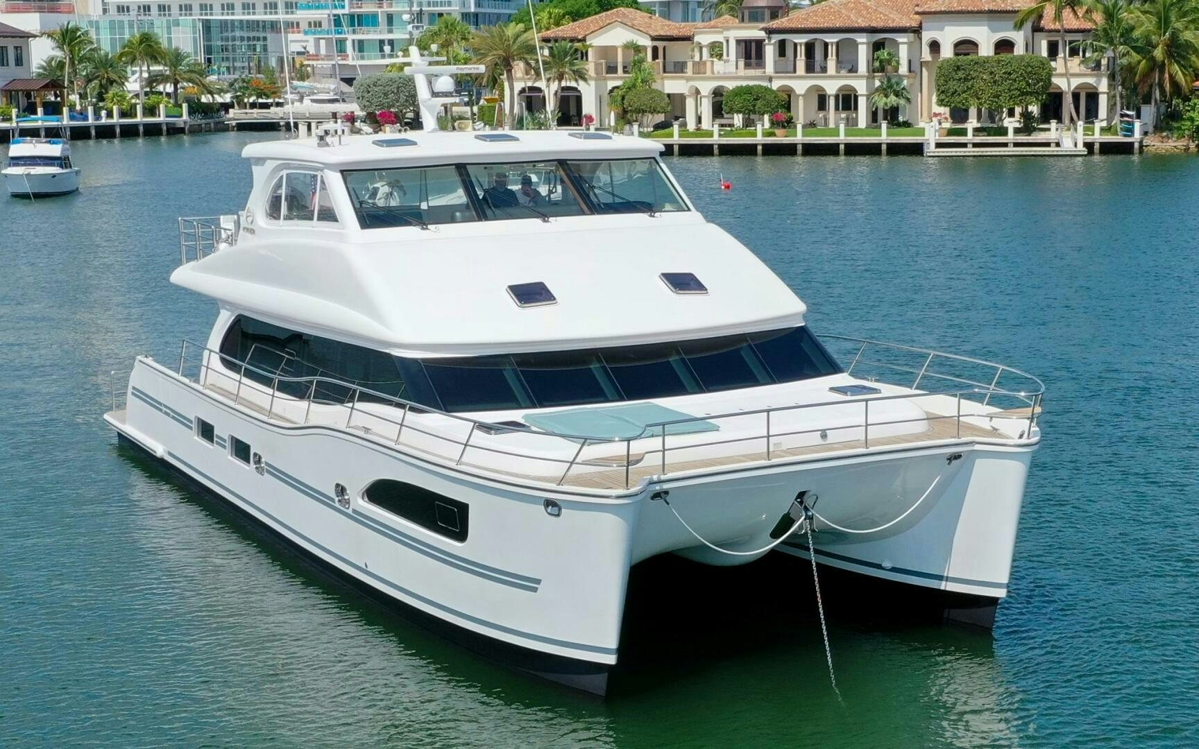 a white yacht in the water aboard CASTINA Yacht for Sale
