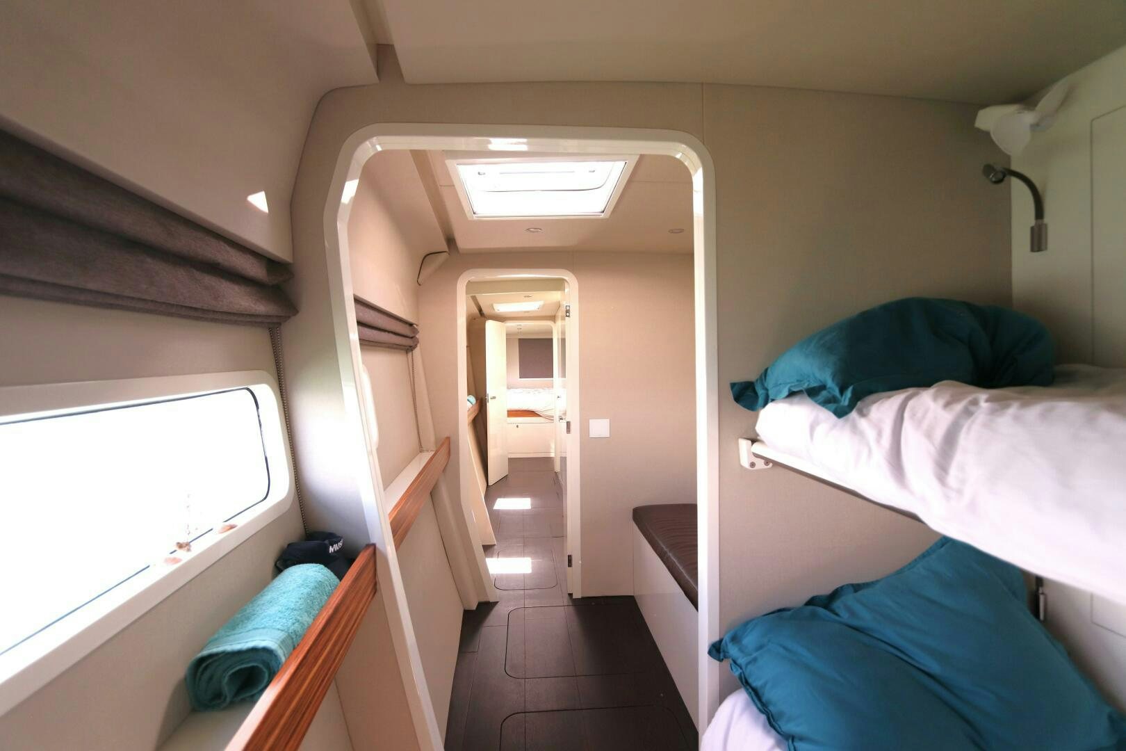 a room with bunk beds aboard CATCH ME Yacht for Sale
