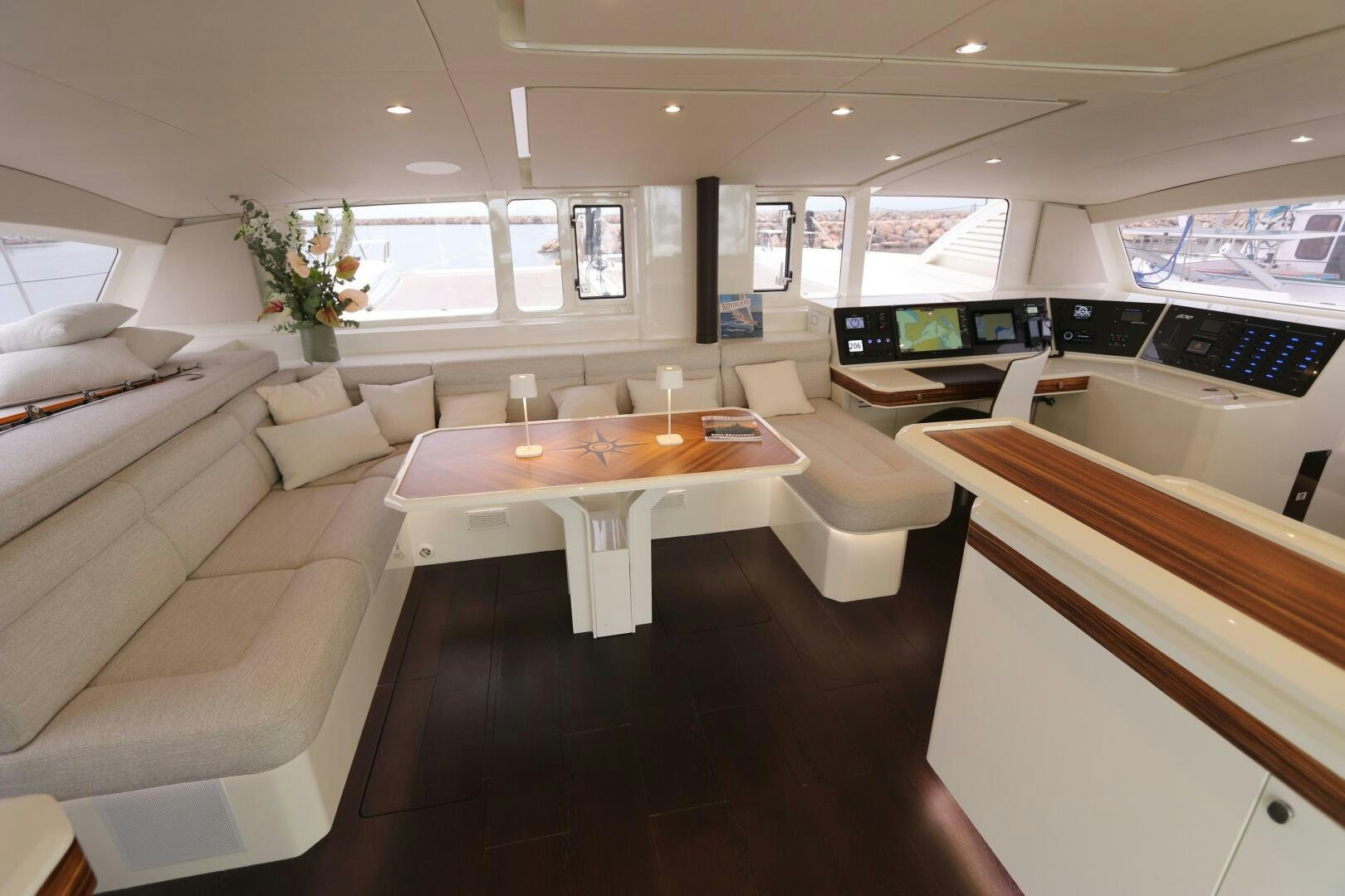 a room with a table and chairs aboard CATCH ME Yacht for Sale