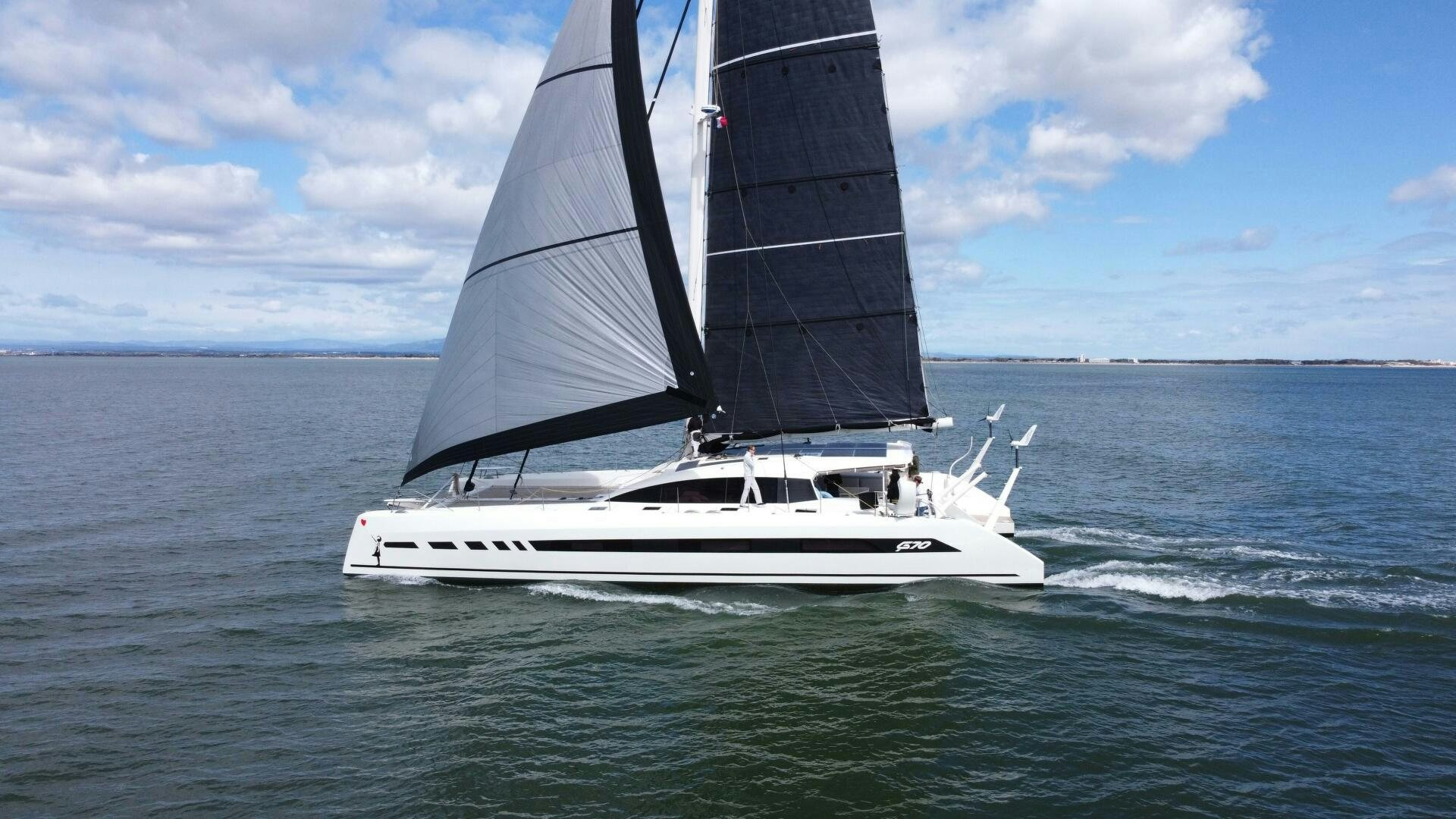 a sailboat on the water aboard CATCH ME Yacht for Sale