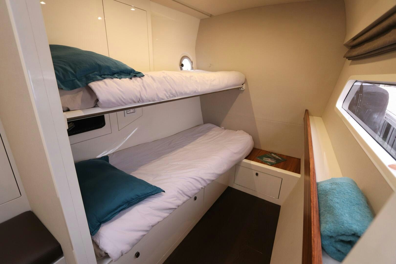 a room with a bed and a television aboard CATCH ME Yacht for Sale