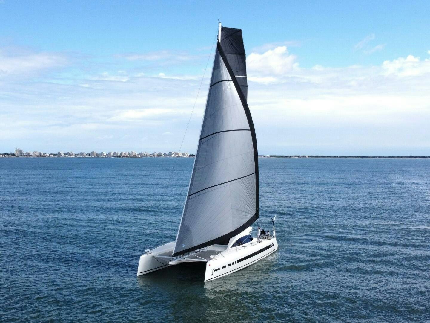 a sailboat on the water aboard CATCH ME Yacht for Sale