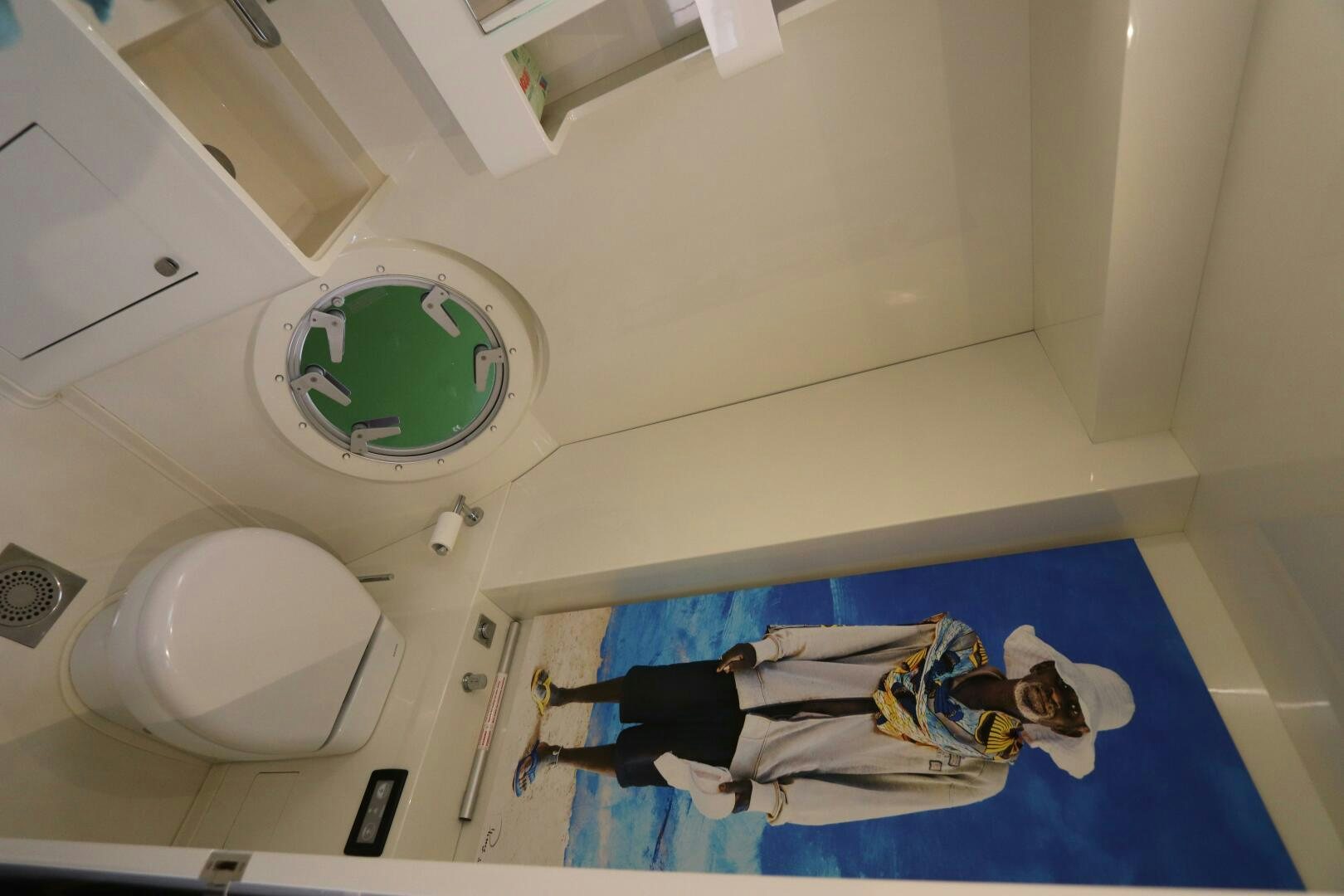 a person lying on a bed aboard CATCH ME Yacht for Sale