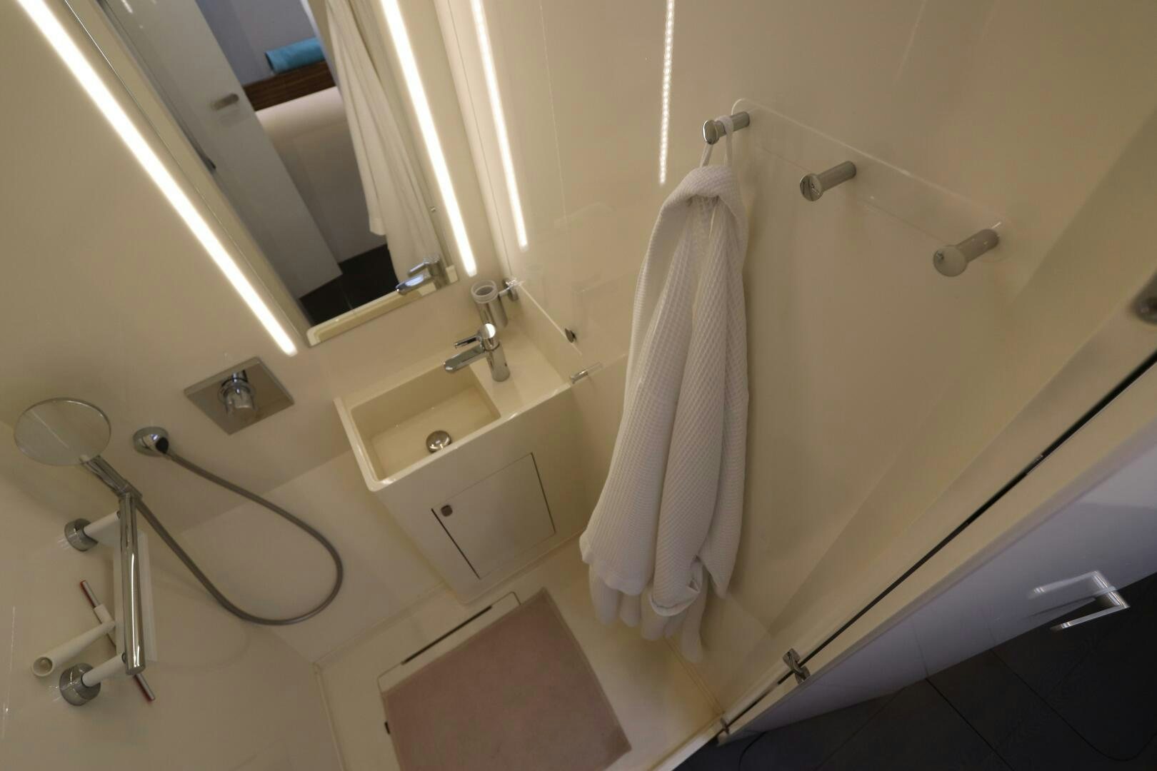 a bathroom with a sink and a toilet aboard CATCH ME Yacht for Sale