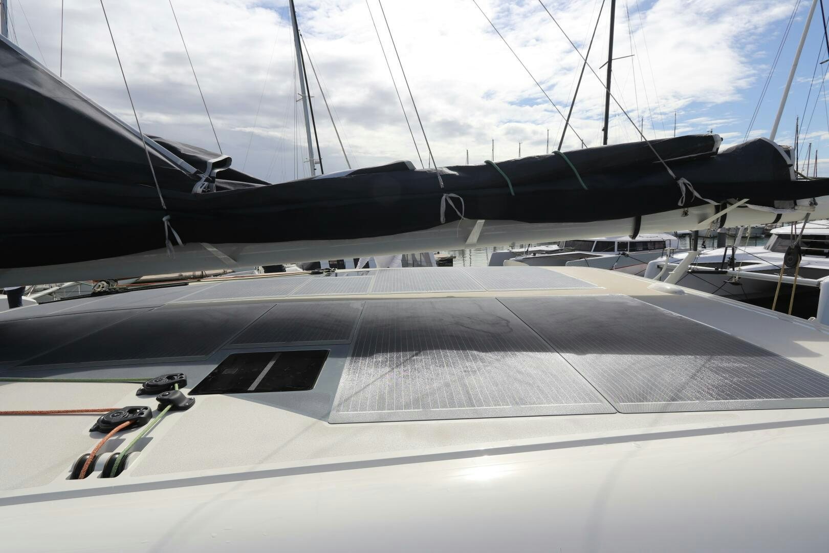 a white car parked in a parking lot aboard CATCH ME Yacht for Sale