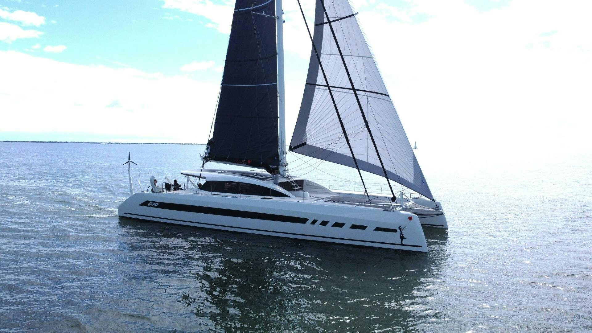 a sailboat on the water aboard CATCH ME Yacht for Sale