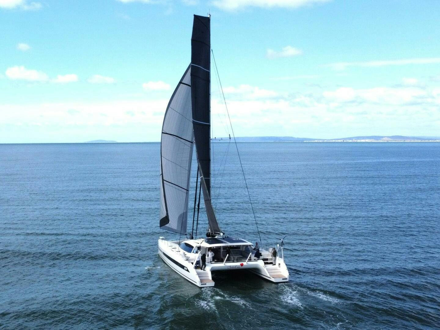a sailboat on the water aboard CATCH ME Yacht for Sale