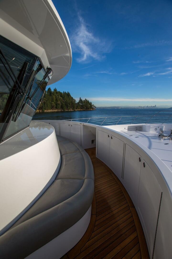 a large open area with a large body of water and a balcony aboard CAZADOR Yacht for Sale