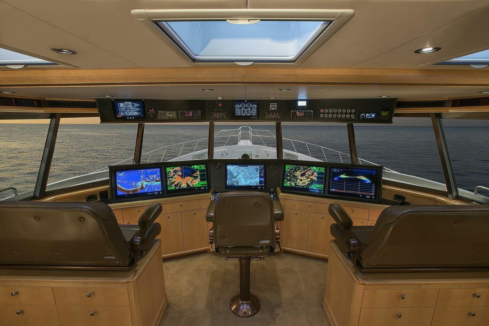 a row of seats on a boat aboard CAZADOR Yacht for Sale