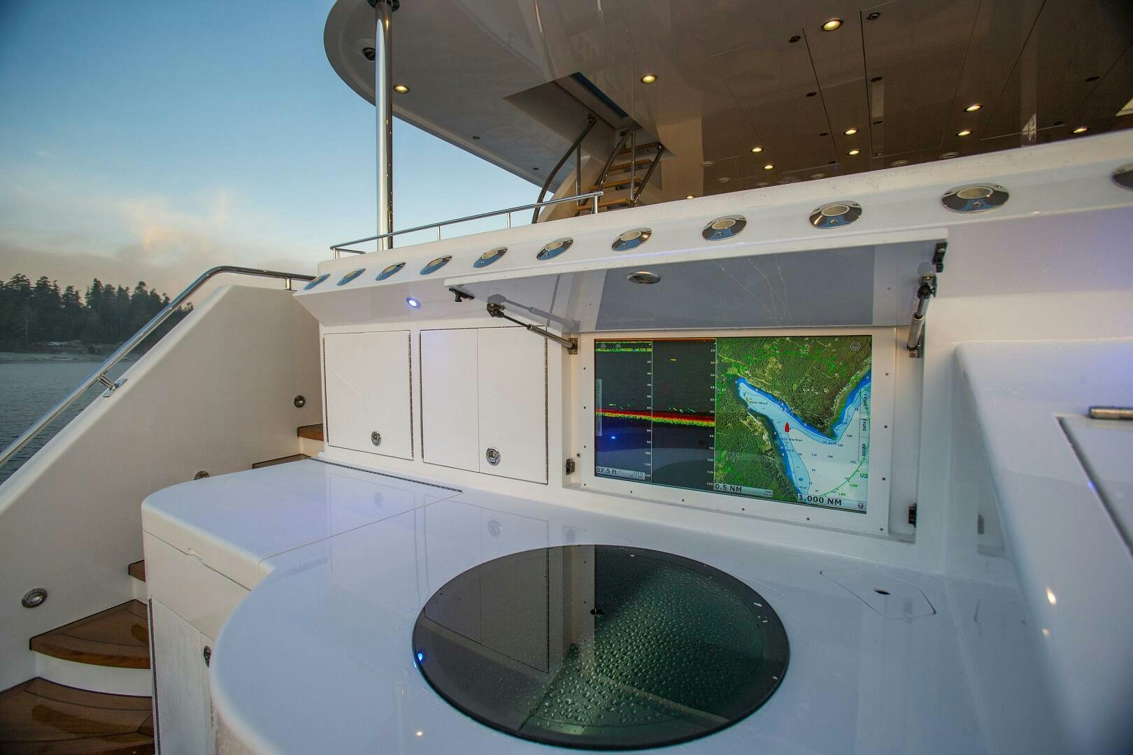 a boat with a large window aboard CAZADOR Yacht for Sale