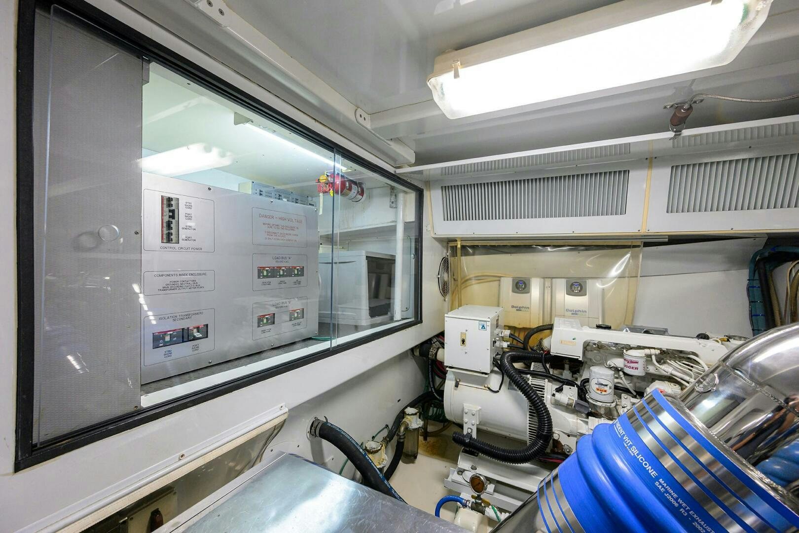 a large machine in a room aboard JR Yacht for Sale