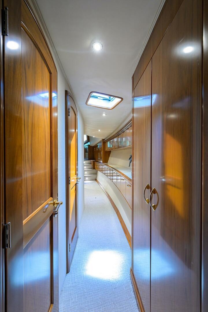 a hallway with doors aboard JR Yacht for Sale