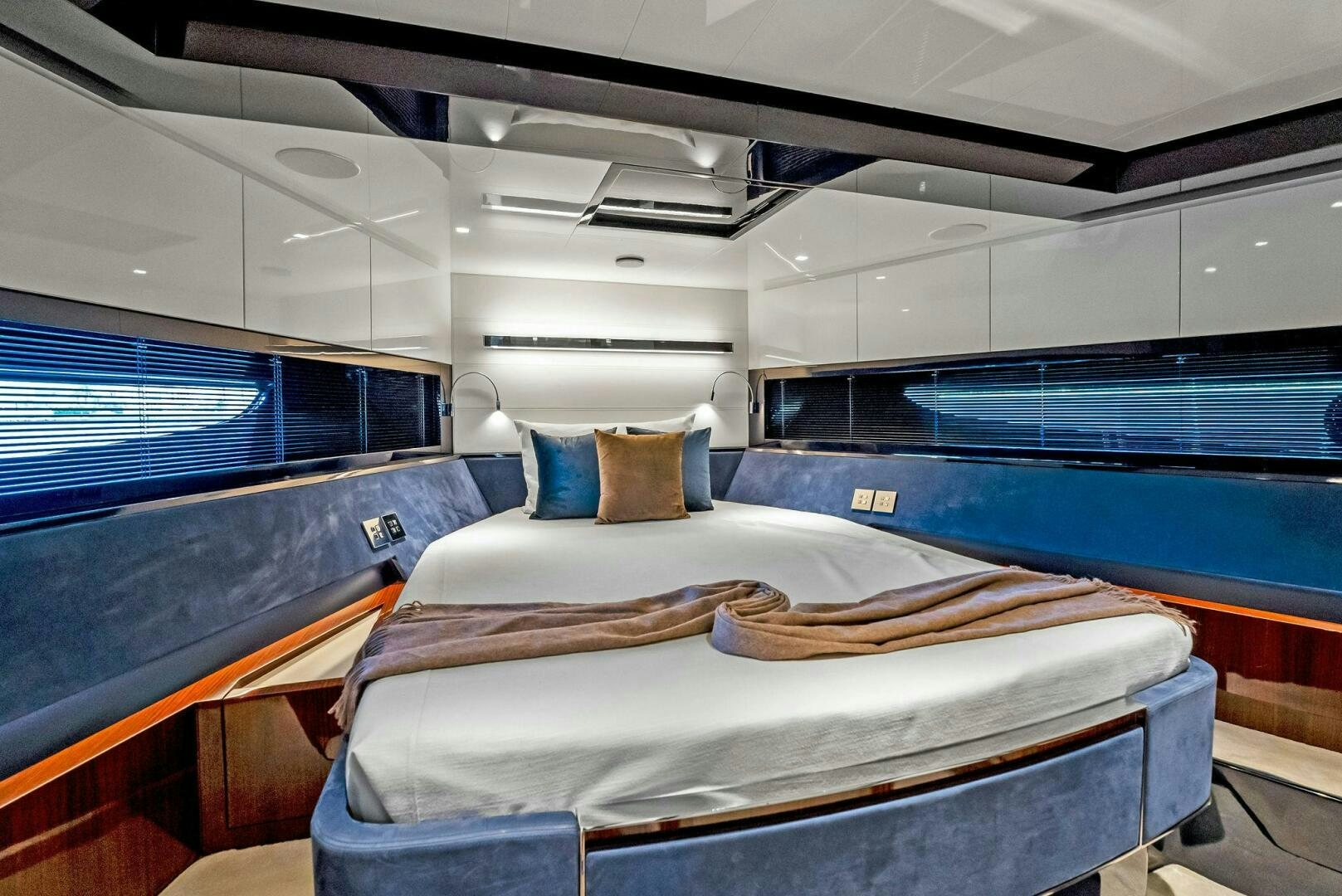 a room with a bed and a window aboard KNOT NORMAL Yacht for Sale