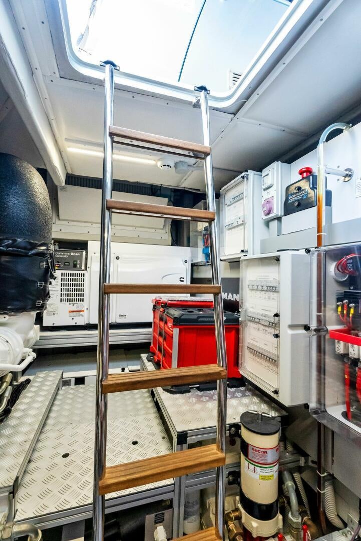a room with shelves and equipment aboard KNOT NORMAL Yacht for Sale