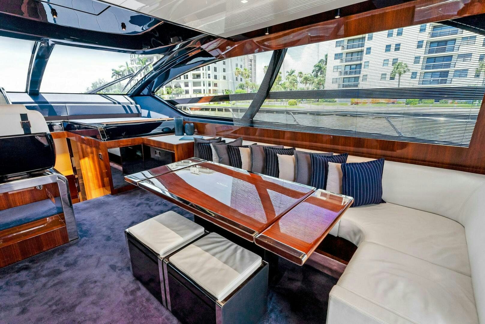 a room with a couch and a table aboard KNOT NORMAL Yacht for Sale