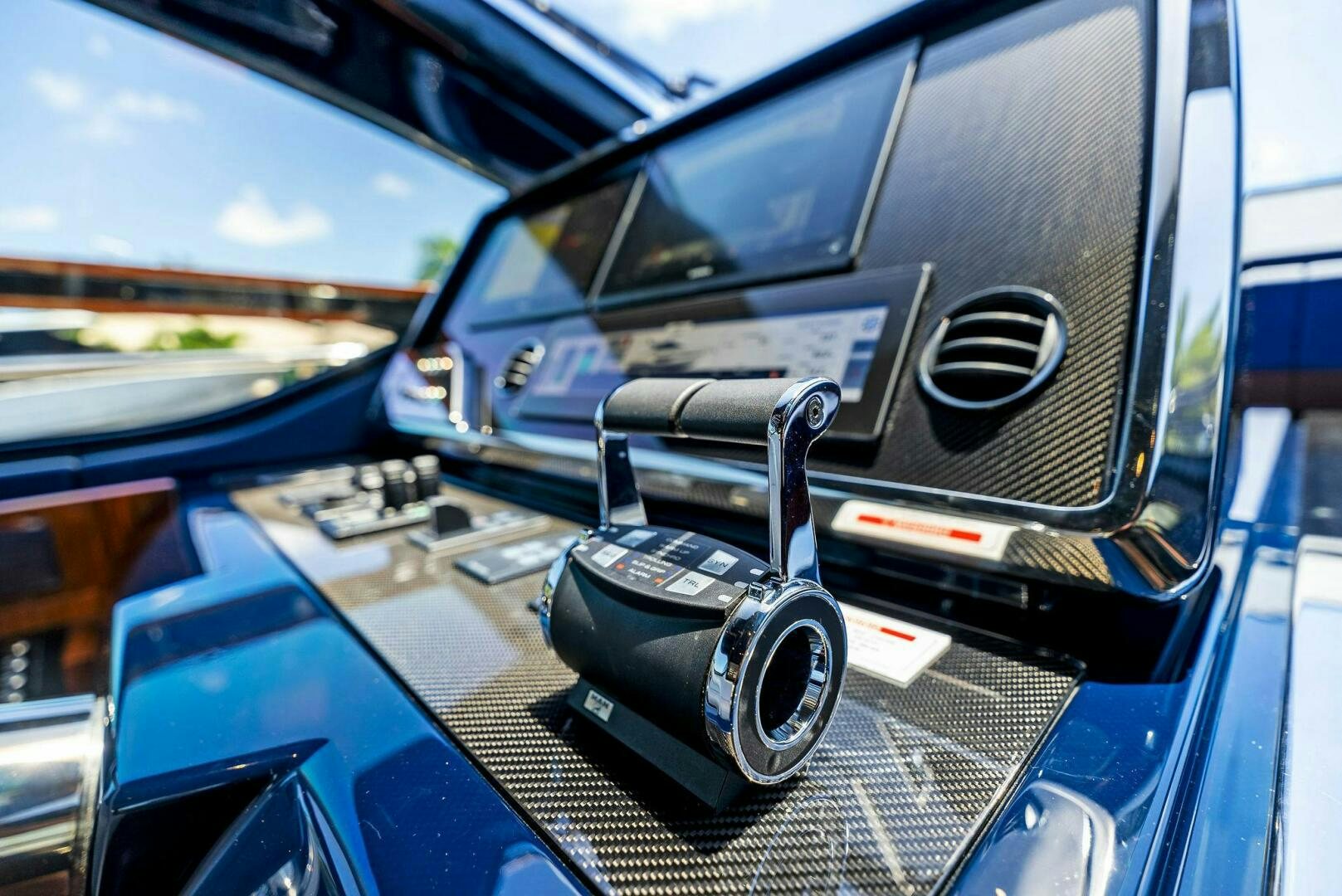 a car with a steering wheel aboard KNOT NORMAL Yacht for Sale