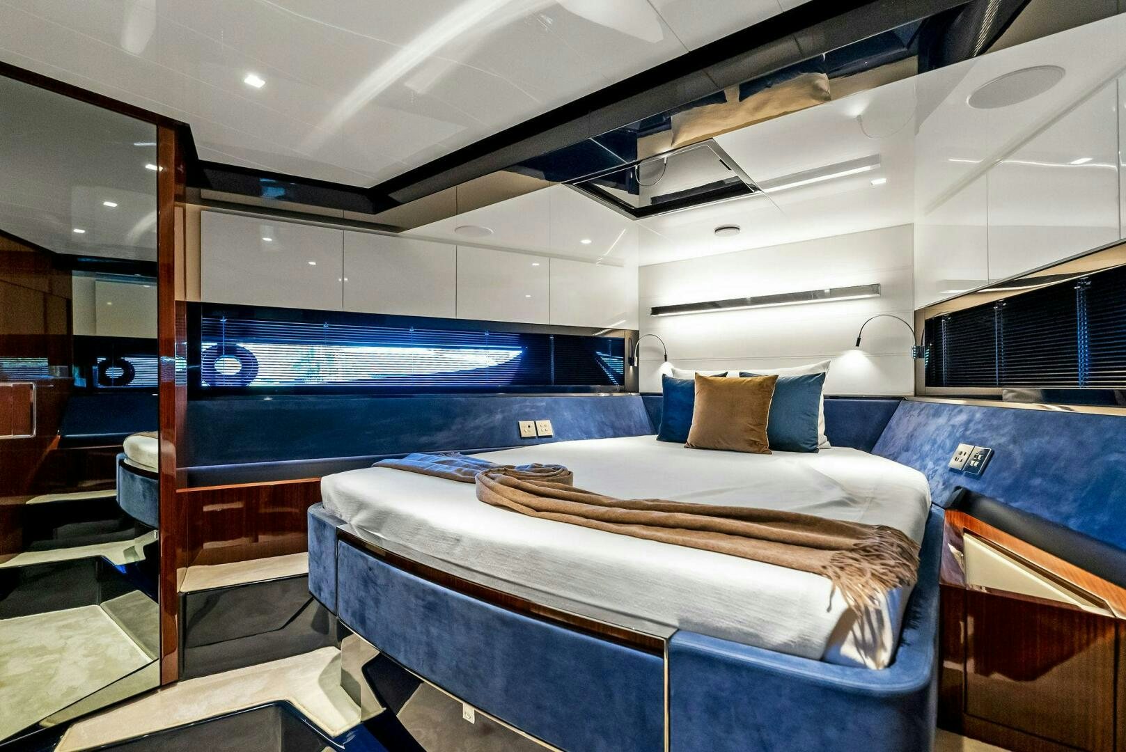 a room with a bed and a window aboard KNOT NORMAL Yacht for Sale