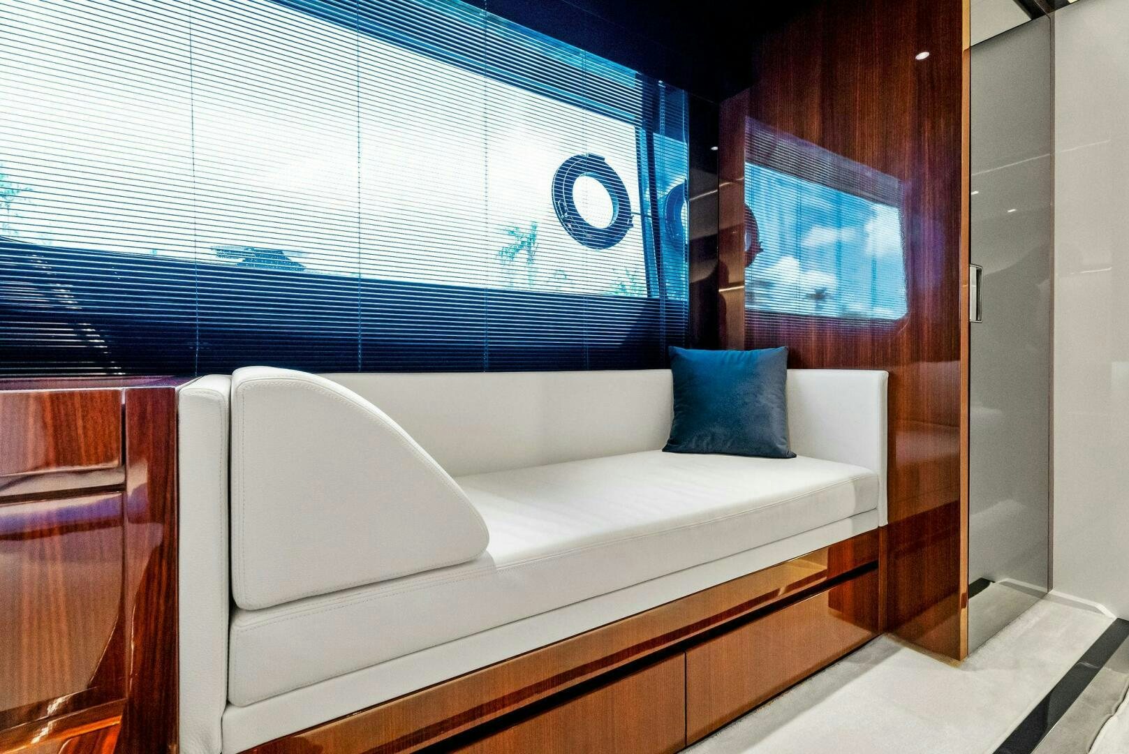 a white couch in a room aboard KNOT NORMAL Yacht for Sale