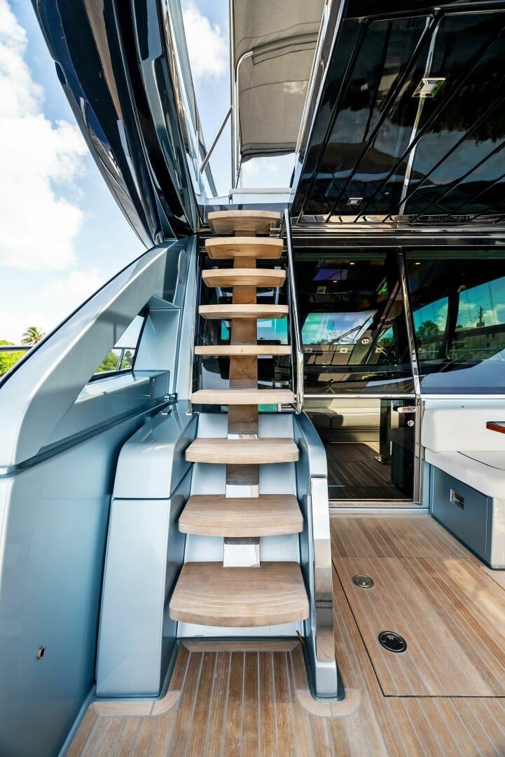 a set of stairs leading to a bus aboard KNOT NORMAL Yacht for Sale