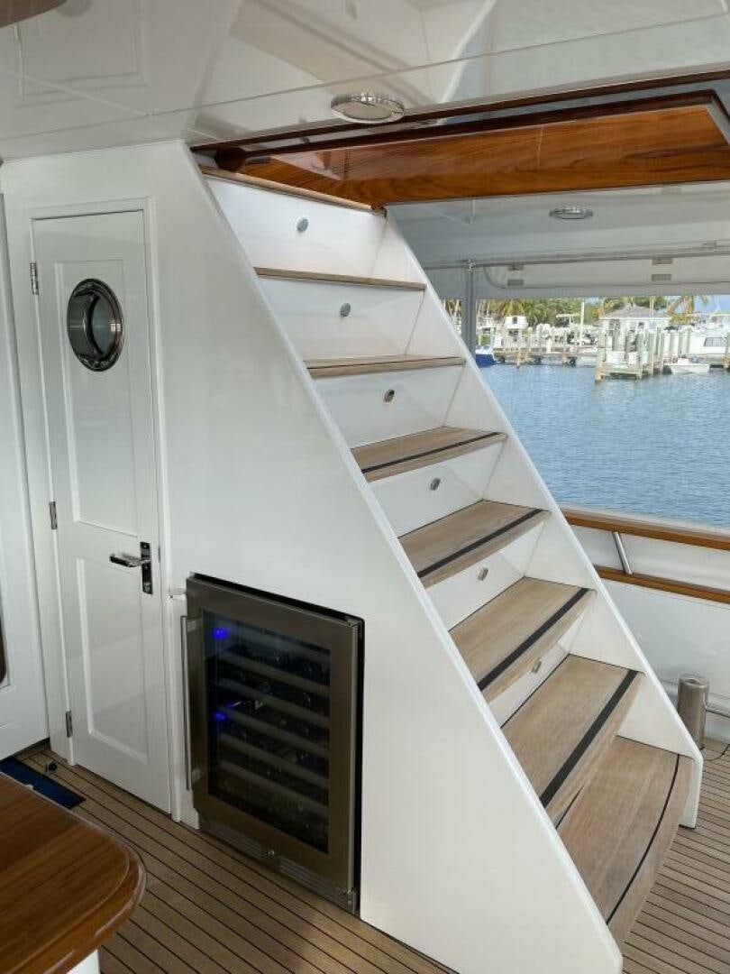 a boat on a deck aboard PRECIOUS CARGO Yacht for Sale