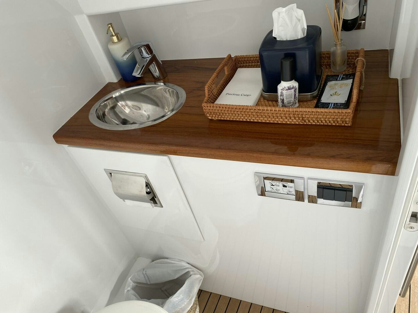 a counter with a sink and a mirror aboard PRECIOUS CARGO Yacht for Sale