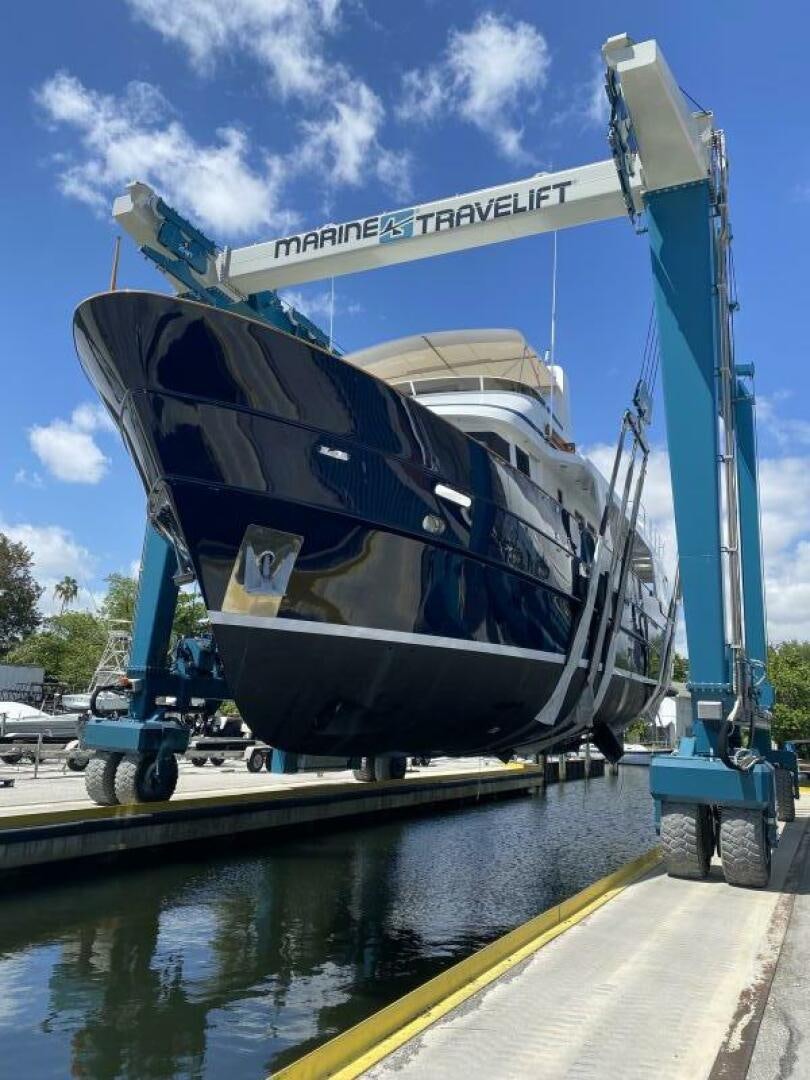 a boat on a dock aboard PRECIOUS CARGO Yacht for Sale