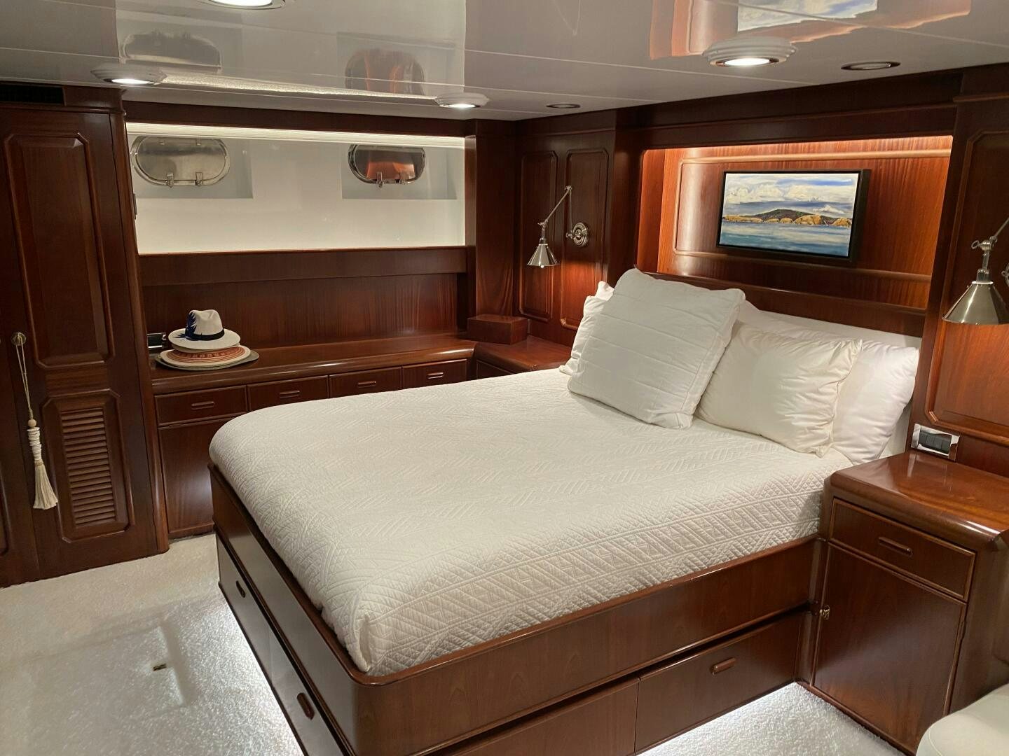 a bed with white sheets aboard PRECIOUS CARGO Yacht for Sale