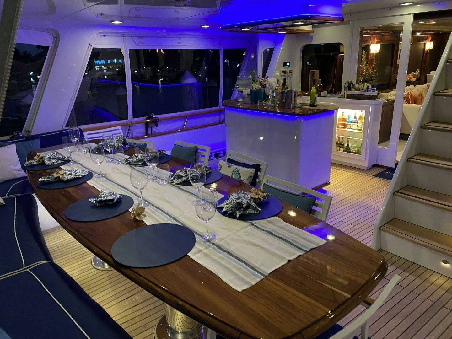 a large kitchen with a table and chairs aboard PRECIOUS CARGO Yacht for Sale