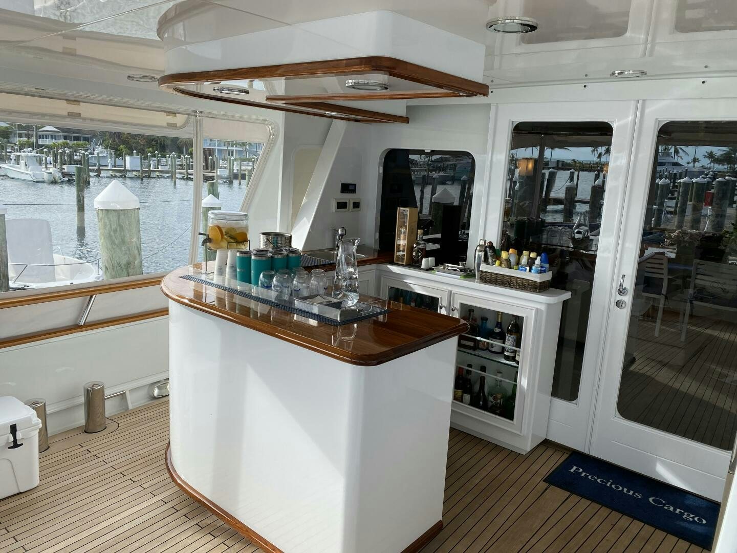 a kitchen with a large glass window aboard PRECIOUS CARGO Yacht for Sale